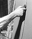 Lucio Fontana en acción